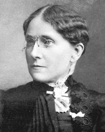 Frances Willard is portrayed with wavy bound hair and small glasses perched on her nose, dressed in a dark dress with a frilly collar. Willard is best known for her leadership in the Women's Christian Temperance Union, which she expanded to join with other groups internationally.