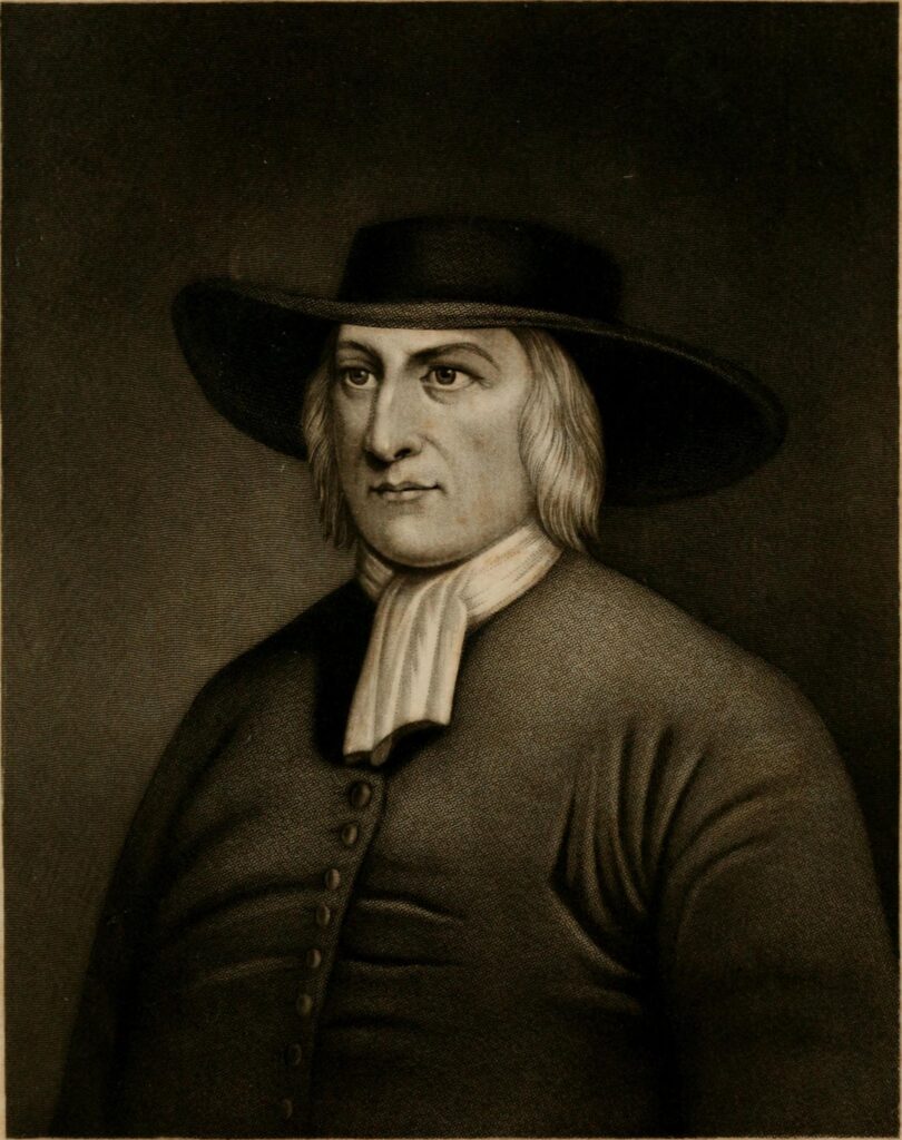 Quaker founder George Fox wearing a broad-brimmed black hat, a white cravat, and a dark coat reminiscent of Puritan clothing.