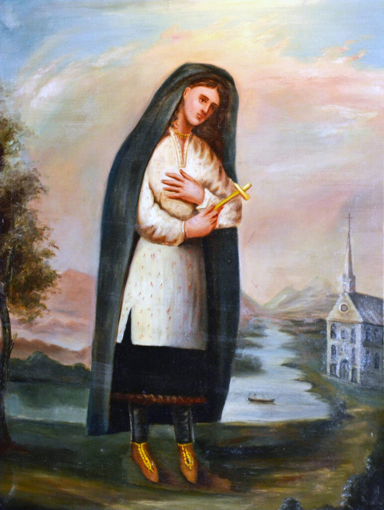 Painting of Kateri Tekakwitha (Mohawk/Algonquin) by Father Claude Chauchetière. Kateri is shown in the foreground draped in a green robe that covers her head and wearing a white tunic and black skirt. She carries a gold cross, and a white church prominently appears on the right side of the page in the background along a river. Tekakwitha was baptized as Catherine in 1676 and would eventually be canonized as a Catholic saint in 2012.
