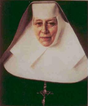 Mother Katharine Drexel, founder of the Sisters of the Blessed Sacrament, is pictured in a Mother's habit with a crucifix.