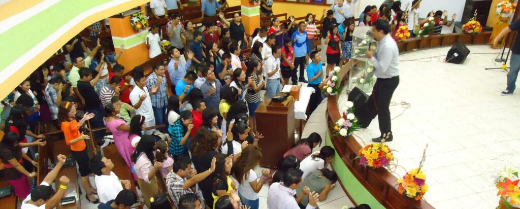 Pentecostals are seen praying in tongues at the Assemblies of God Church in Cancún, Mexico, 2012.