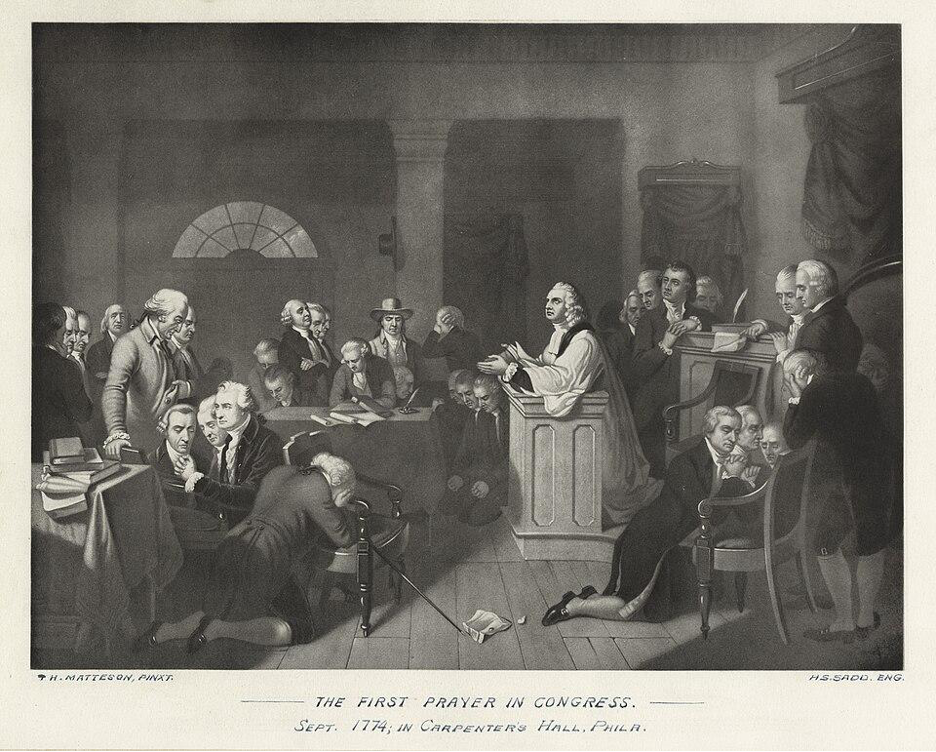 Depiction of the first prayer in Congress at Philadelphia led by Reverend Jacob Duche, September 7, 1774, based on a painting by Tompkins Harrison Matteson. Below the image are the words, "H. Matteson, Pinxt" in the left corner, "-The First Prayer in Congress- Sept. 1774; in Carpenter's Hall. Phila." in the center, and "HS. Sado. Eng" to the right. The congressmen are kneeling or standing with hands clasped and heads bowed. The image points to the unification of congressmen in faith.